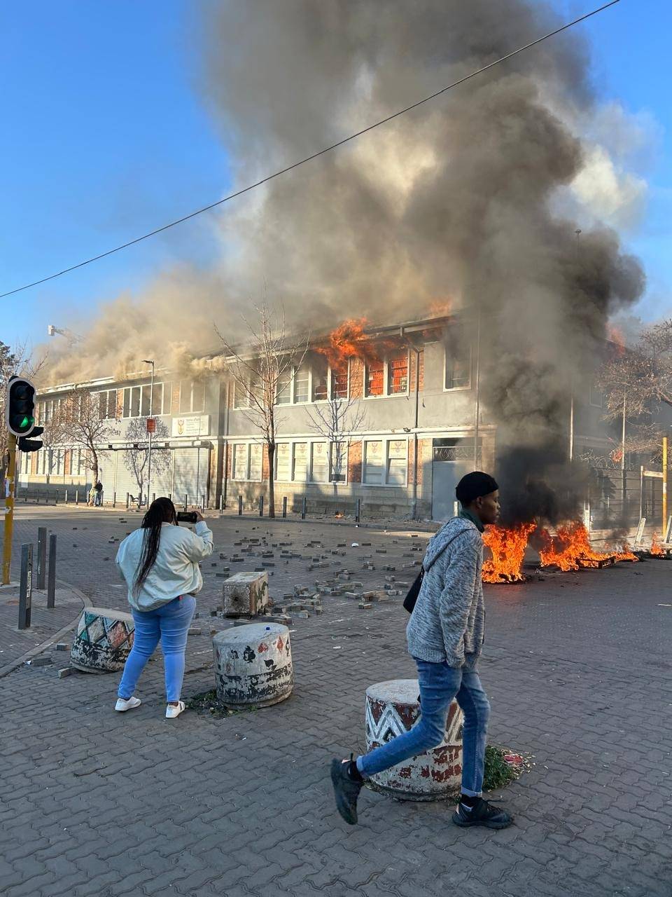 The blaze that engulfed Germiston's Home Affairs is under control, and two suspects were arrested.